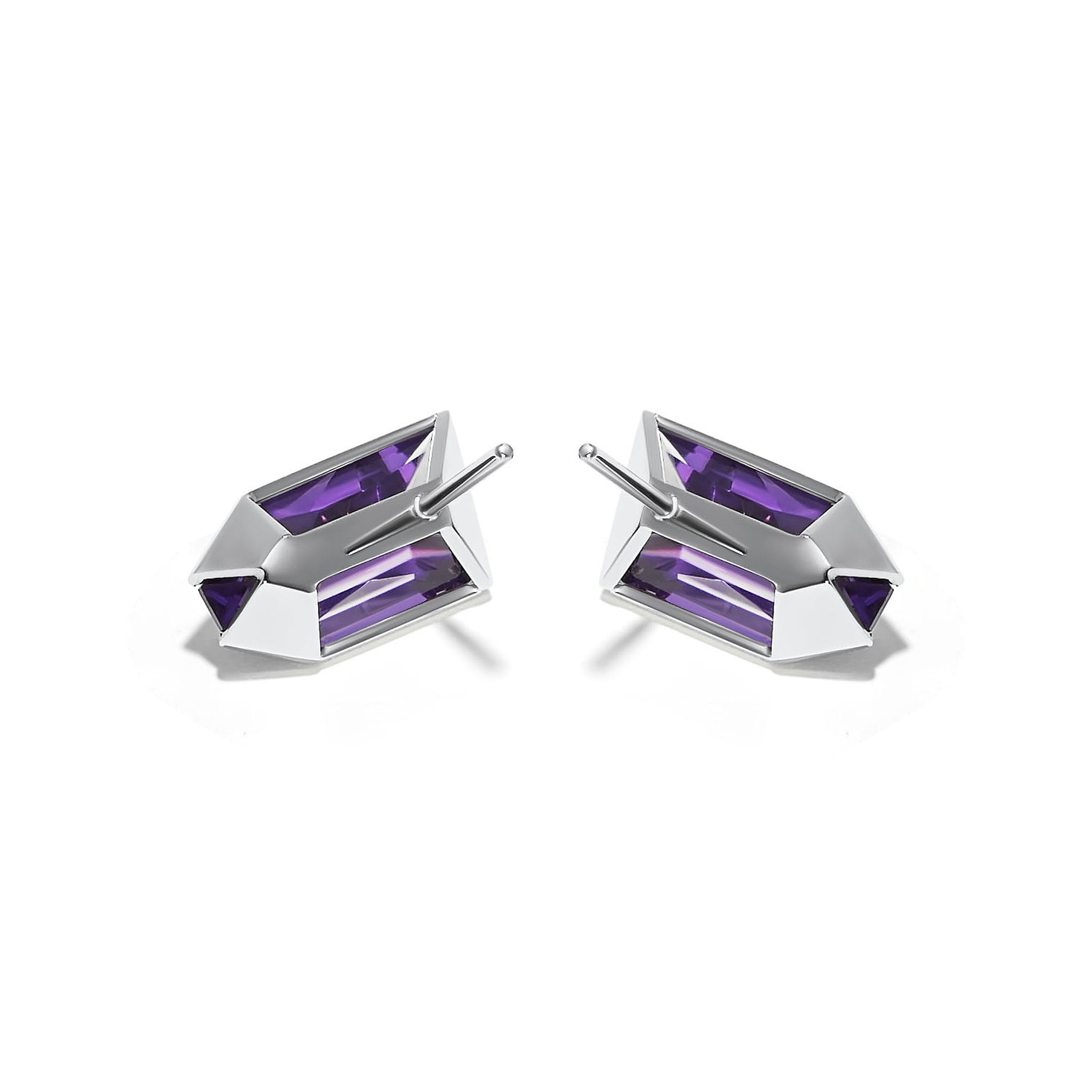 What sets the Airborne Amethyst Earrings apart is their aerodynamic design. The earrings are crafted with a sense of movement and fluidity, reflecting a sleek and graceful aesthetic. The way they hang and catch the light is truly mesmerizing,