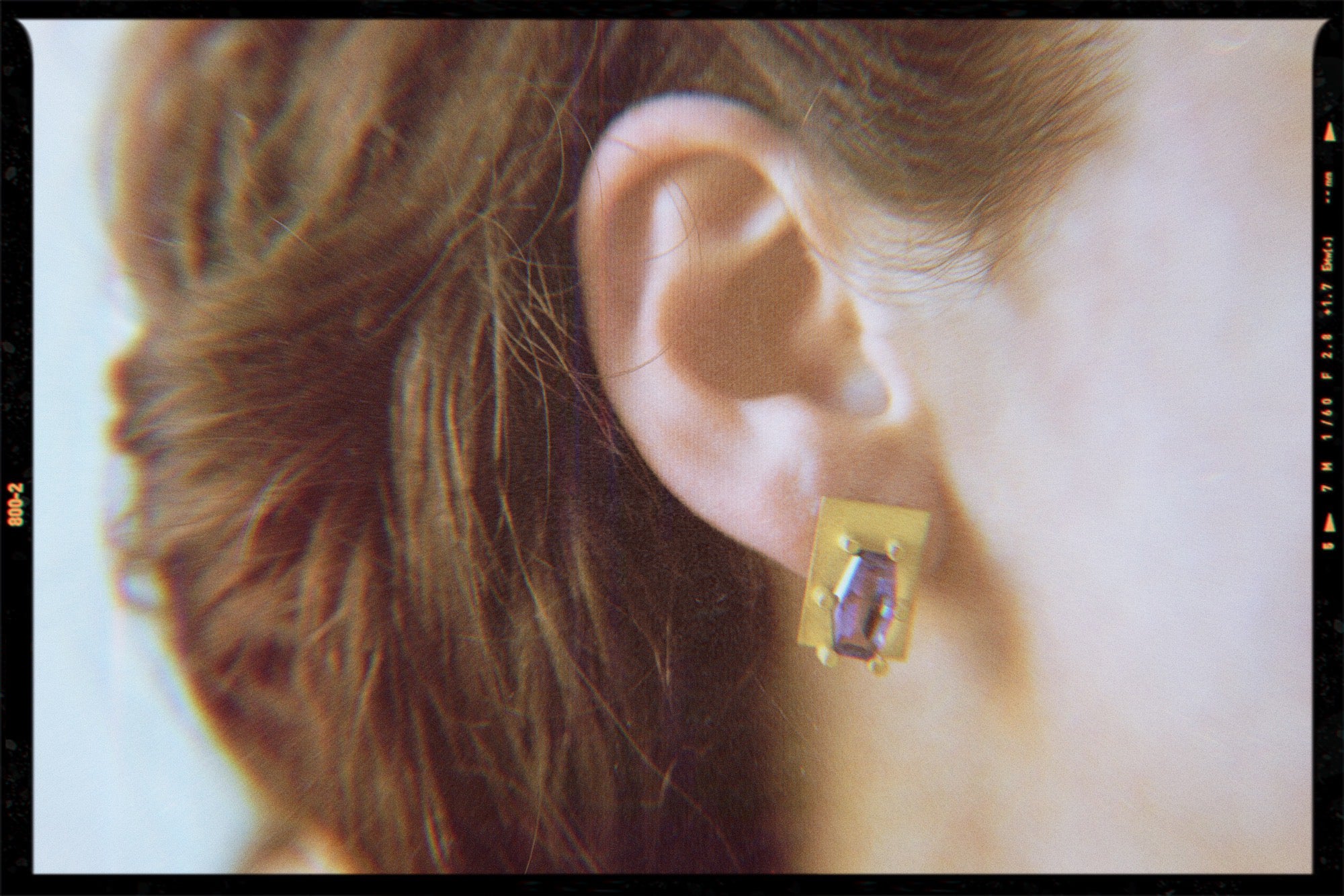 Auralandi earrings in 19.2 Karat Gold with fancy hexagon cut amethysts, won by model Antonia Grant, photographed by Benjamin Jones. The extensive art collection housed in the Palazzo Doria Pamphilj in Rome, visited by Hugo since early youth, led him to create something unique after his grandmother Aura.